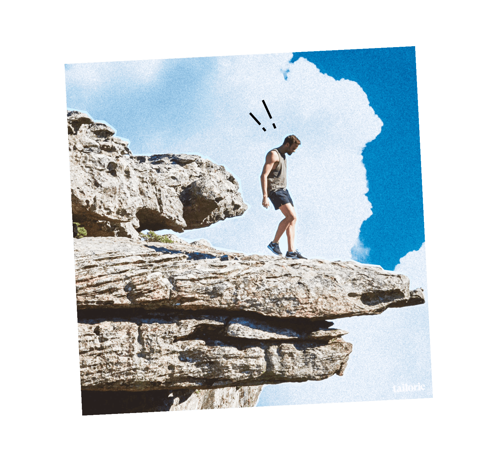 man looking over a daunting cliff